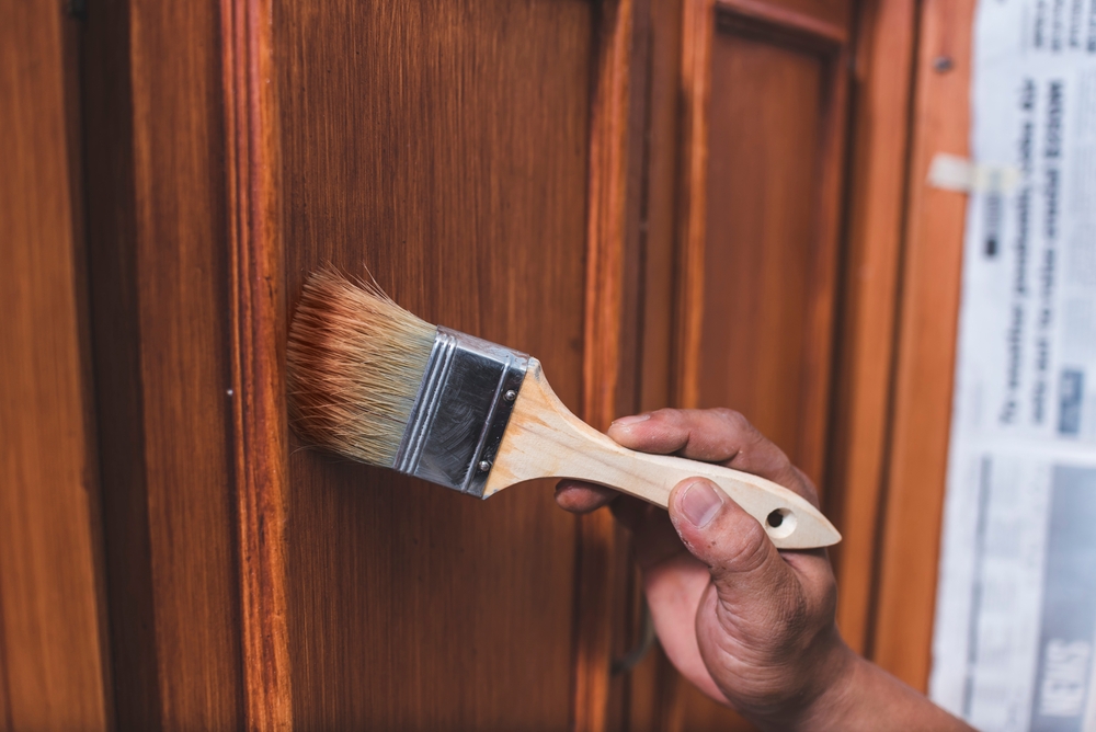 How Professionals Refinish Cabinets With Stain: A Guide From MHC Painting